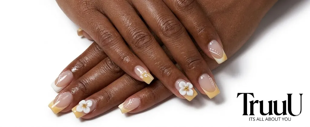 Close-up of elegant manicured nails with TruuU logo
